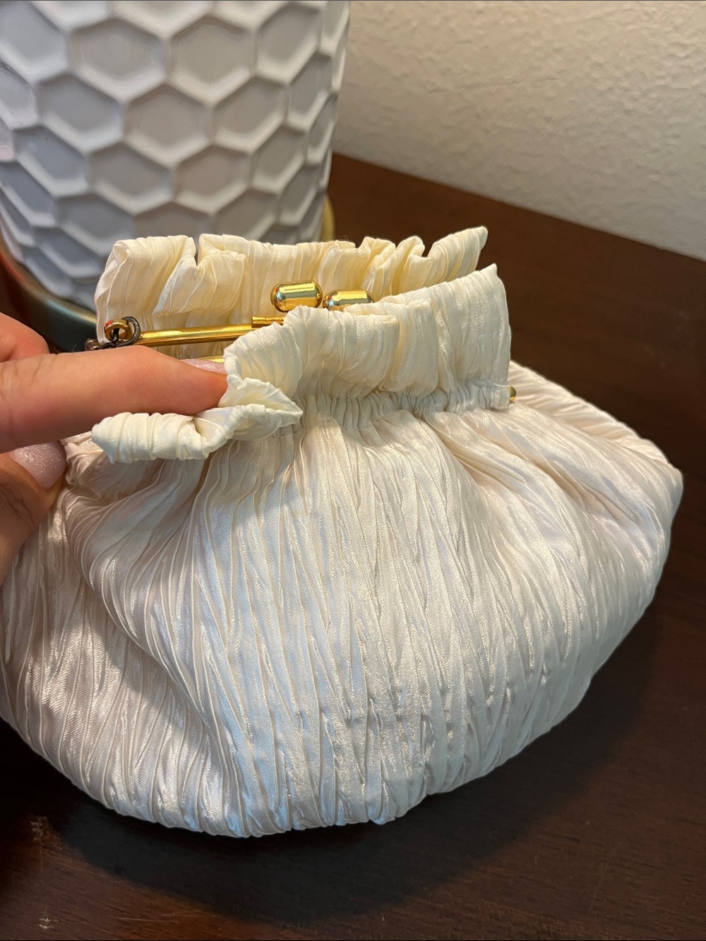 La Regale Ivory Ruched Satin Frame Wristlet with Gold Hardware